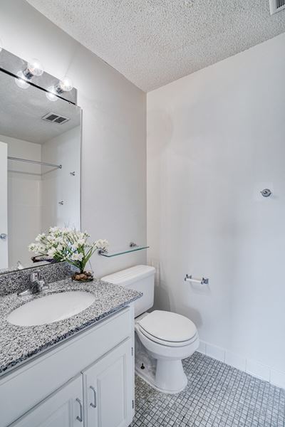 Bathroom With Tile-Style Flooring